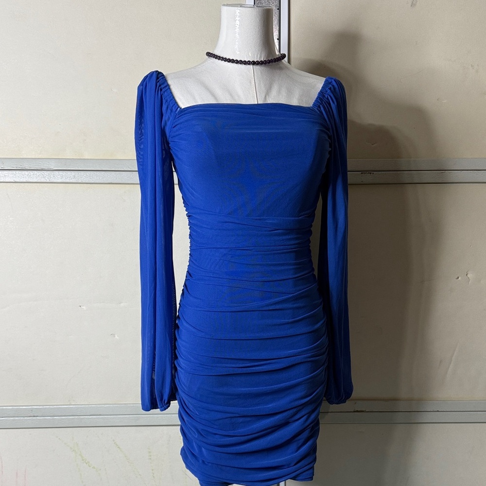 Elegant Blue Long Sleeve Dress callout tear in the bottom